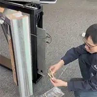 Teknisi melakukan wiring sistem turnstile di Depok